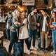 A group of travellers together at an event